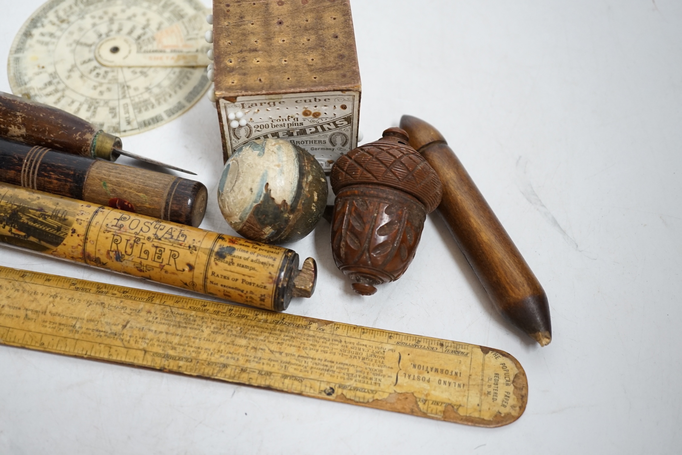 A collection of treen and sundry items to include bone crochet hooks, sewing items, a treen cricket bat shaped letter opener, etc. Condition - varies, poor to fair